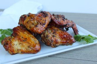 Grilled Thai Chicken Wings, cooked on indirect heat for juicy, flavorful wings.