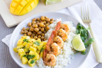 Jerk Shrimp with Coconut Cauliflower Rice, spiced chickpeas, and a mango salsa