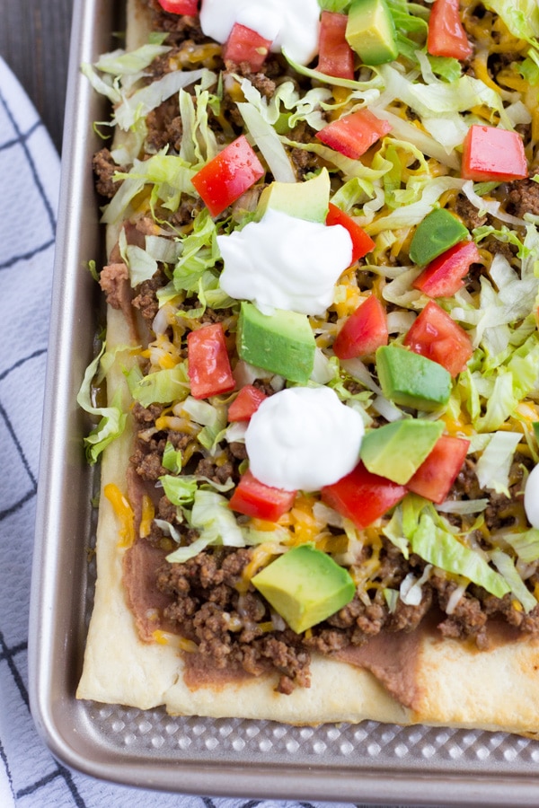 Crescent Dough Taco Pizza on a baking sheet.